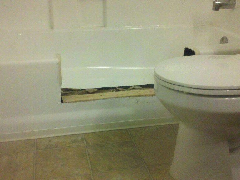 View how we cut out a piece where the new walk-in for the bathtub goes